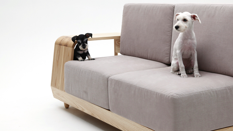 Illustration for article titled This Sofa With Attached Dog House Is One Perfect Idea